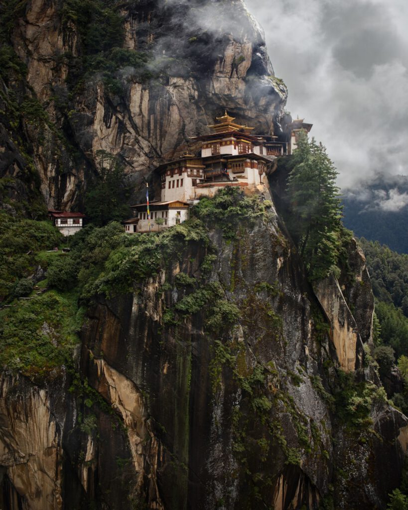 A mountain with a building on top of it