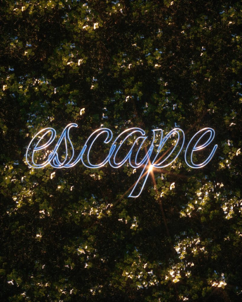 a picture of a light painting of the word escape